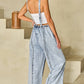 Beau Blue Light Wash Frayed Exposed Seam Wide Leg Denim Overall